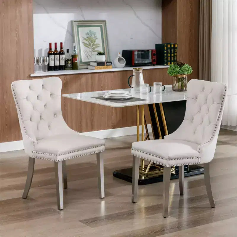 Set di 2 sedie da pranzo moderne Zeus & Ruta in velluto, con imbottitura trapuntata di alta qualità, struttura in legno massiccio e gambe con placcatura in acciaio inossidabile cromato