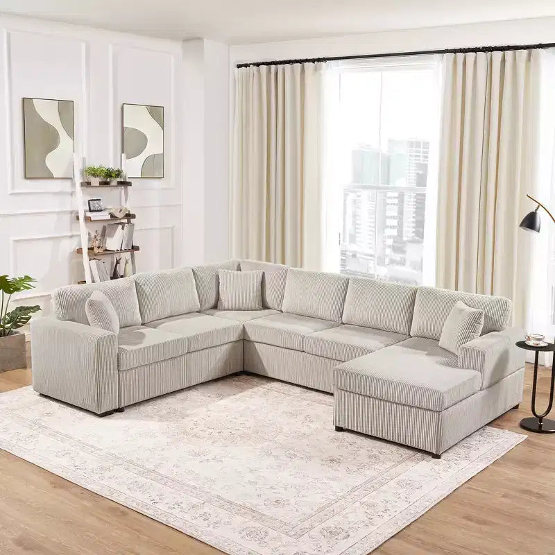 Divano sezionale Whisen Oversize in velluto a coste con penisola e tre morbidi cuscini decorativi
