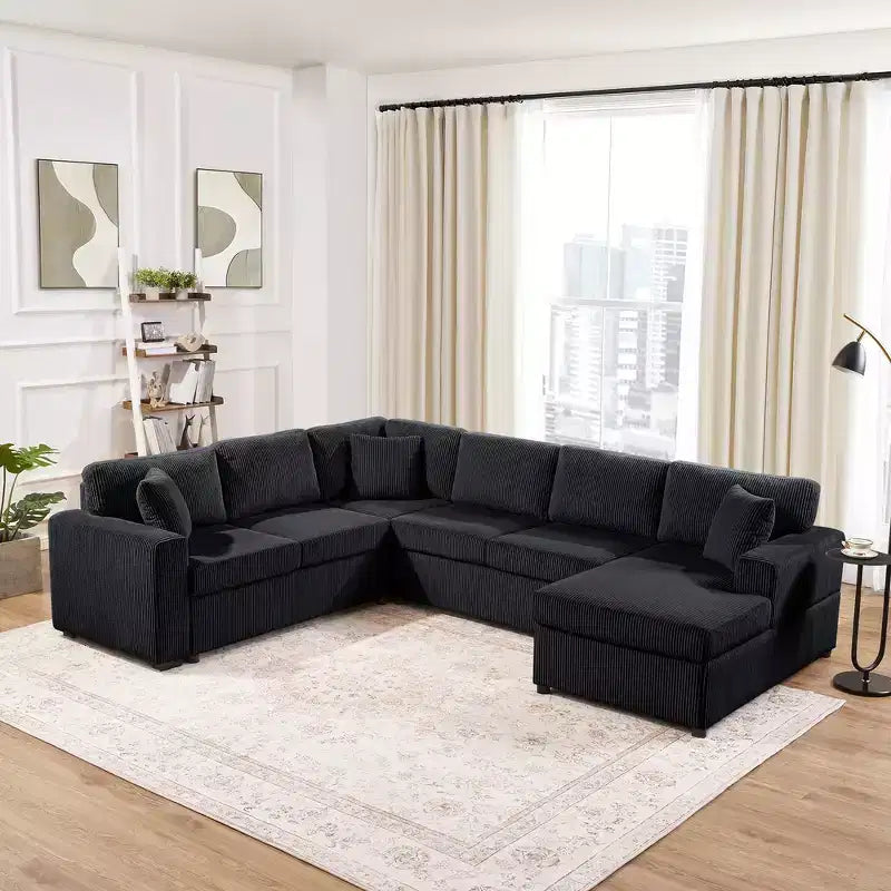 Divano sezionale Whisen Oversize in velluto a coste con penisola e tre morbidi cuscini decorativi