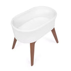 Culla Portatile per Neonati Delta Children Aero con Gambe in Legno, Bianca