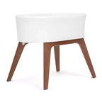 Culla Portatile per Neonati Delta Children Aero con Gambe in Legno, Bianca