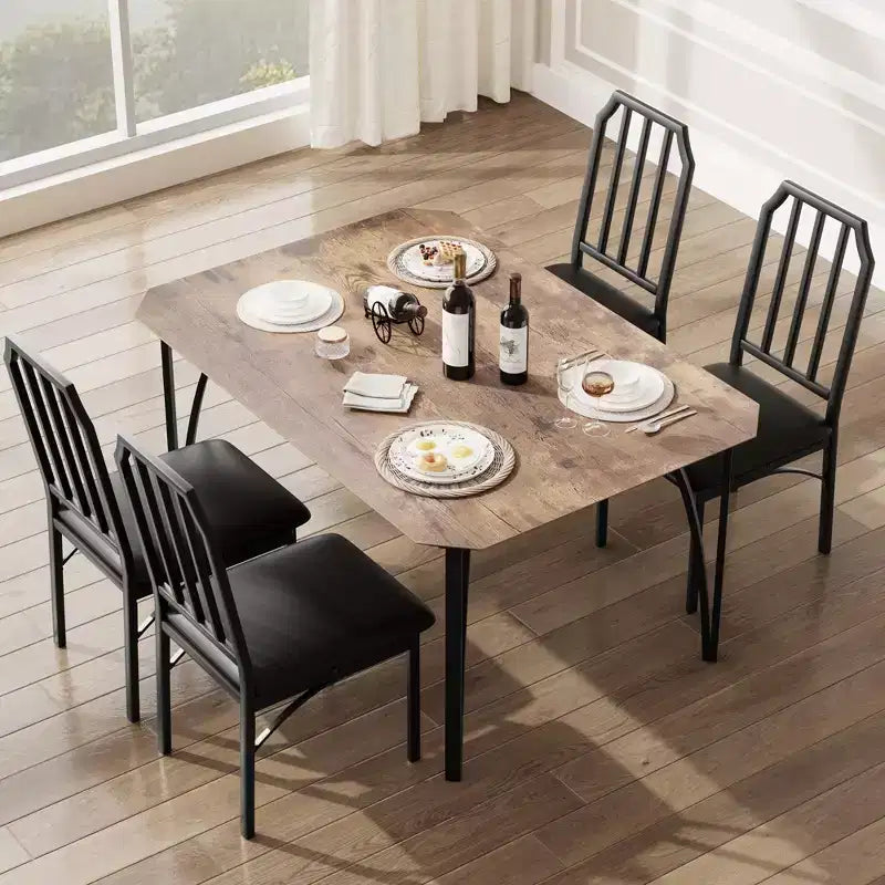 Set da pranzo compatto con bordi smussati e sedie imbottite, perfetto arredamento da cucina e sala da pranzo per piccoli appartamenti e case