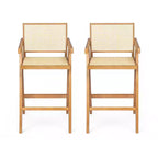 Sgabelli da bar Okak (set da 2) in legno massello ad altezza bancone per sale da pranzo, poltrone con schienale in rattan per isole cucina, finitura naturale