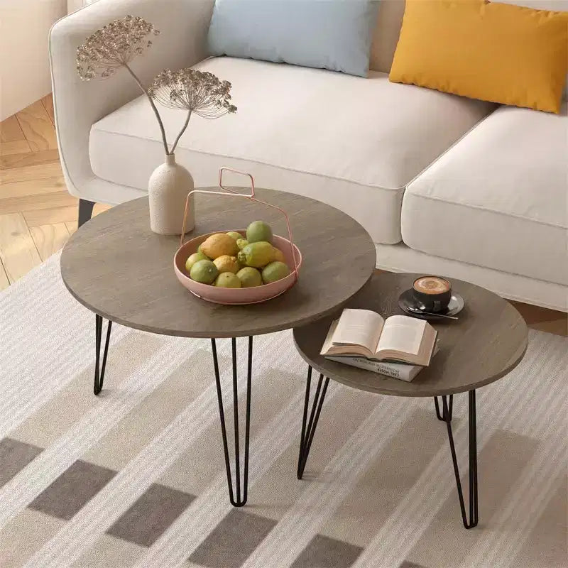 Set di 2 tavolini da caffè rotondi impilabili, piano in finto marmo da 60 cm con struttura in metallo, tavolini in legno per soggiorno