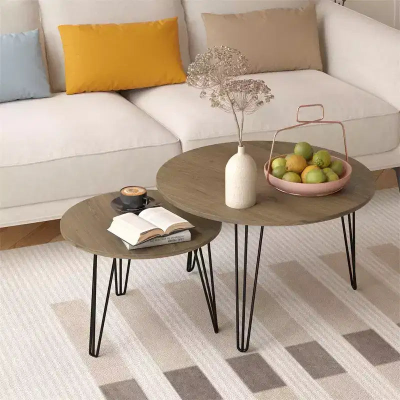 Set di 2 tavolini da caffè rotondi impilabili, piano in finto marmo da 60 cm con struttura in metallo, tavolini in legno per soggiorno