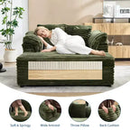Poltrona chaise longue oversize da interno, comodo divano lounge in velluto a coste con ampi braccioli imbottiti e cuscini decorativi, accogliente divano letto per soggiorno