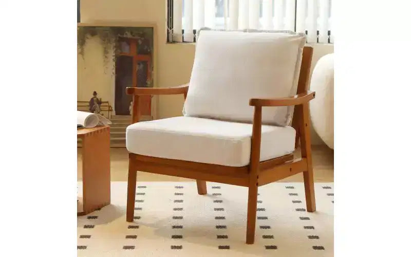 Poltrona di design moderno con struttura in legno massello e cuscino in tessuto felpato, seduta versatile per soggiorno, camera da letto