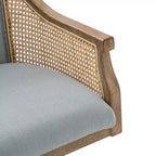 Poltrona operativa Danilo Swivel con braccioli in rattan e cuscino in misto lino naturale e schiuma | ARTFUL LIVING DESIGN