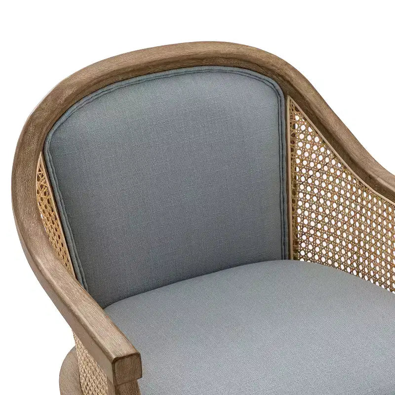 Poltrona operativa Danilo Swivel con braccioli in rattan e cuscino in misto lino naturale e schiuma | ARTFUL LIVING DESIGN