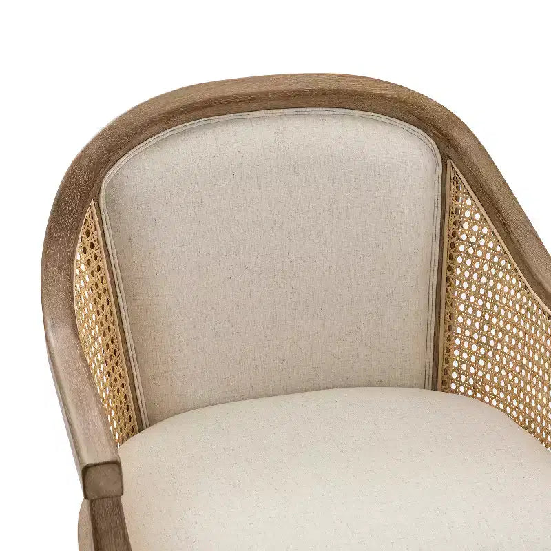 Poltrona operativa Danilo Swivel con braccioli in rattan e cuscino in misto lino naturale e schiuma | ARTFUL LIVING DESIGN
